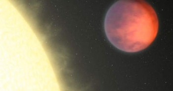 Wizja artystyczna planety pozasłonecznej Ypsilon Andromedae b obiegającej swoją młodą gwiazdę podobną do Słońca (NASA/JPL-Caltech)