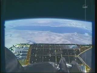 Widok z ramienia SSRMS - 12:25 CET / Credits - NASA TV
