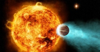 Planeta CoRoT-2b najprawdopodobniej przyspiesza rotację gwiazdy macierzystej, co ma związek z burzą promieni X, która oddziałuje na planetę. Credits: NASA/CXC/M.Weiss