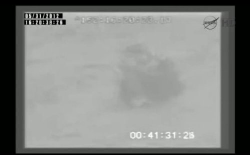 Dragon unoszący się na falach Oceanu Spokojnego / Credits: NASA TV