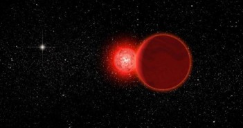 Wizja artystyczna układu WISE 0720−0846 podczas przelotu niedaleko Słońca (jasna gwiazda w tle) / Credits - Michael Osadciw/University of Rochester