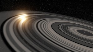 Wizja pierścieni wokół J1407b przesłaniających gwiazdę układu / Credits - Rob Miller