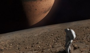 Wizja lat 30. XXI wieku? Astronauta spogląda na Marsa z powierzchni Fobosa / Credits - NASA