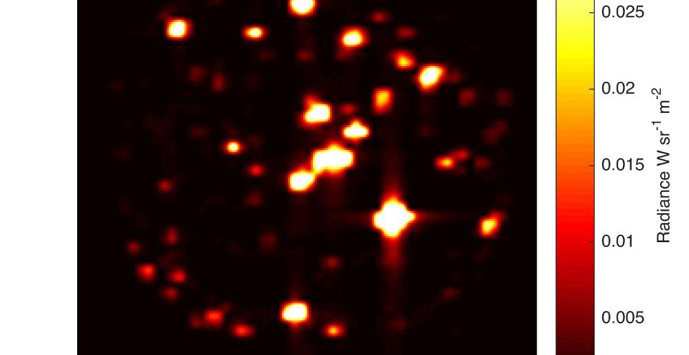 Obraz Io w zakresie podczerwonym w cieniu Jowisza. Jasne obszary to miejsca prawdopodobnej aktywności wulkanicznej / Credits - NASA/JPL-Caltech/SwRI